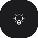 Symbol einer hellen Glühbirne auf dunklem Hintergrund